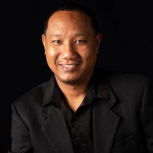 Kadeem Tam, J.P.
